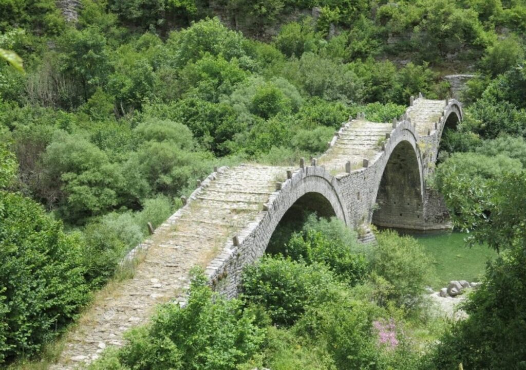 Cobbled three arch bridge in Greece