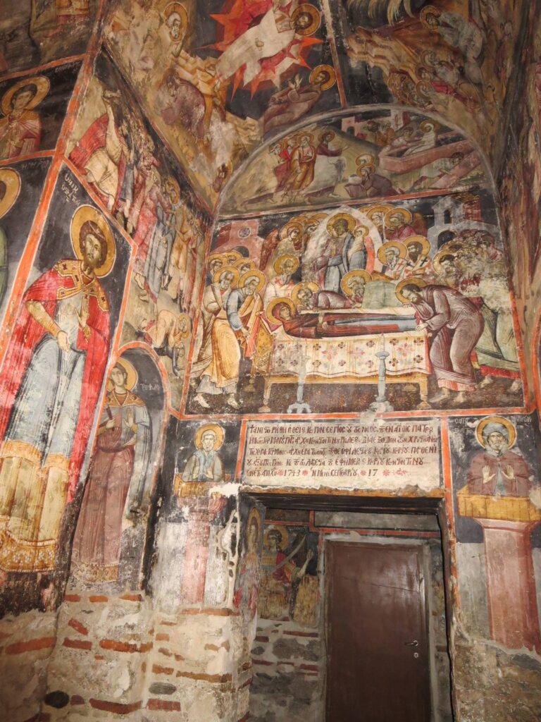 Colourful Byzantine frescoes at Aghios Germanos church, above the Prespa Lakes